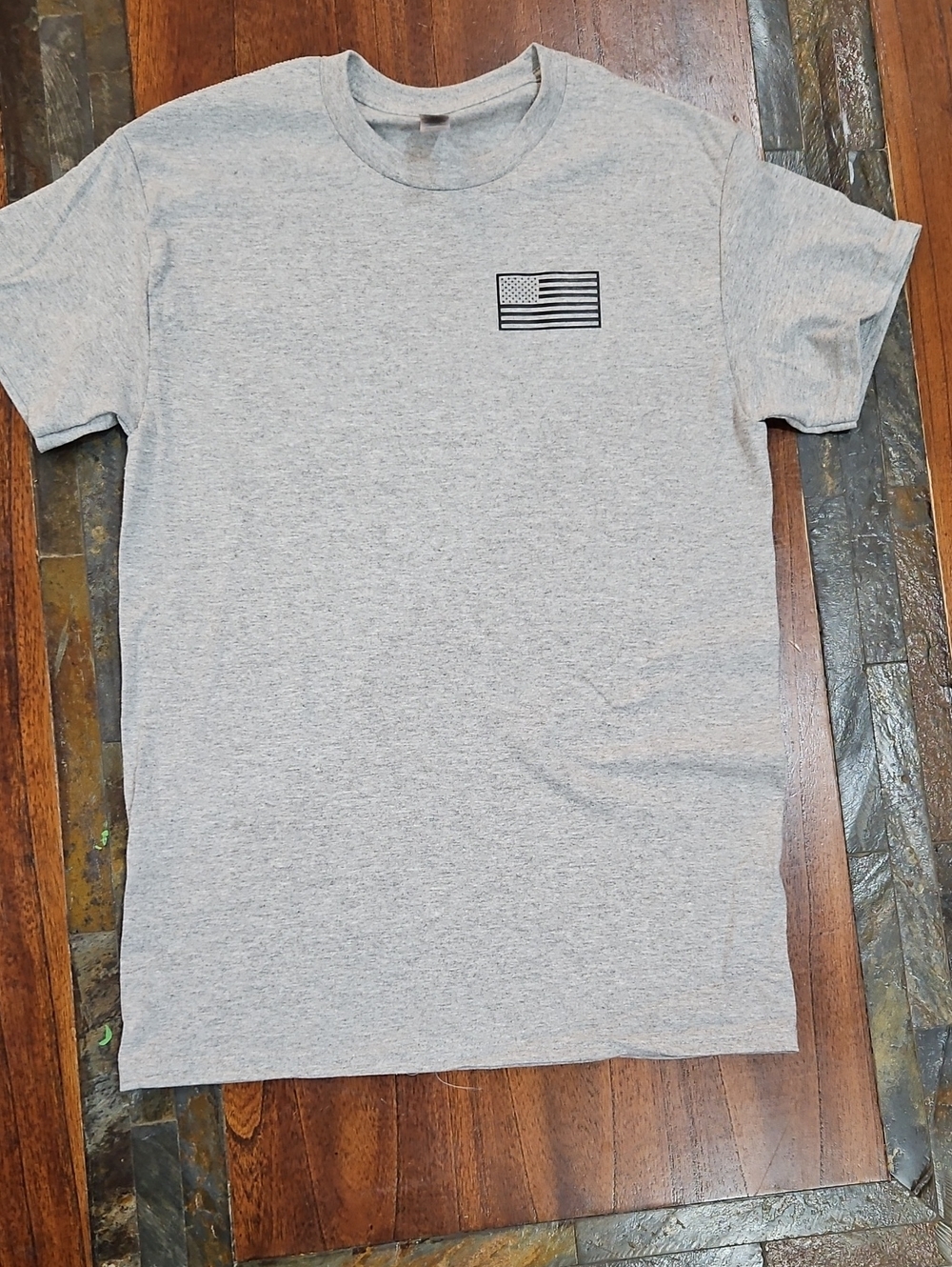 Gildan Light Gray Short Sleeve Crewneck T-Shirt with Black Flag Graphic